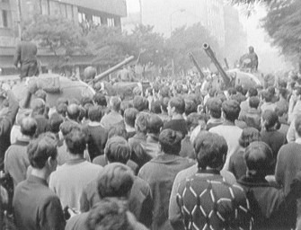 Invasion tanks surrounded by people